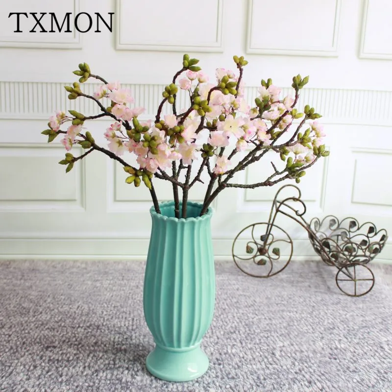 High-end simulation flower short branch cherry blossom decoration living room party flower Himalayan complex cherry blossom
High-end simulation flower short branch cherry blossom decoration living room party flower Himalayan complex cherry blossom