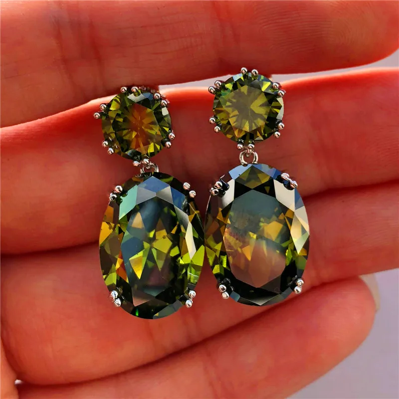 Luxury Crystal Female Peridot Stud Earrings Vintage 925 Sterling Silver Wedding Jewelry Big White Blue Black Earrings For Women
Luxury Crystal Female Peridot Stud Earrings Vintage 925 Sterling Silver Wedding Jewelry Big White Blue Black Earrings For Women