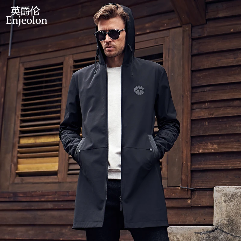 Enjeolon brand new hoodies long trench coat men clothing Quality male black trench coat windbreaker jacket plus size 3XL JK0419
Enjeolon brand new hoodies long trench coat men clothing Quality male black trench coat windbreaker jacket plus size 3XL JK0419