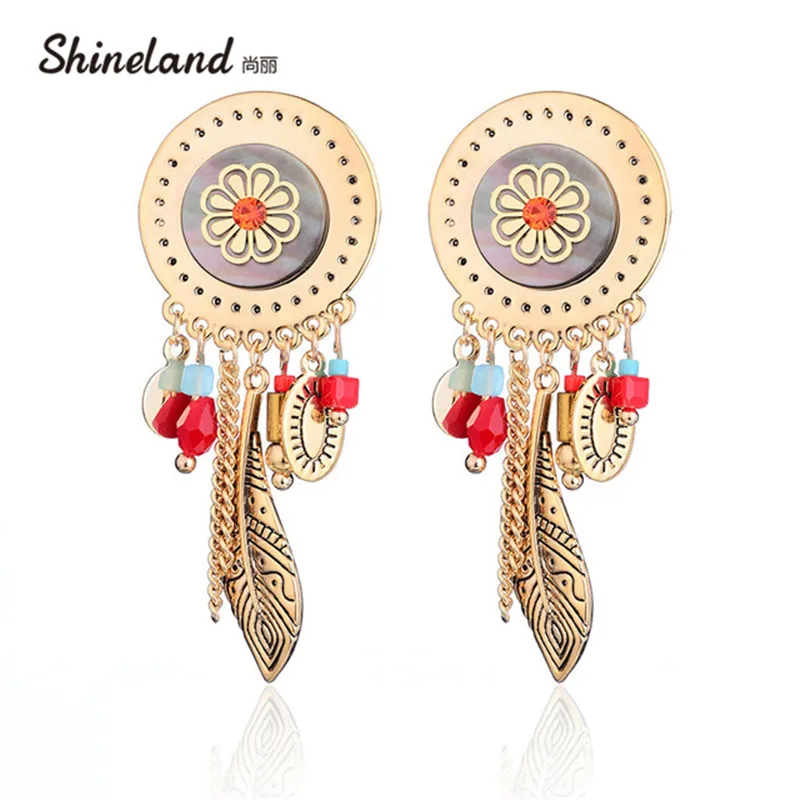 Shineland Hot Sale Gold Silver Color Shell Feather Beads Ethnic Vintage Charms Statement Carved Dangle Drop Earrings for Women
Shineland Hot Sale Gold Silver Color Shell Feather Beads Ethnic Vintage Charms Statement Carved Dangle Drop Earrings for Women