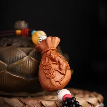 Chinese Peach Wood Carving Money Bag Safe And Good Luck Exquisite Car Key Pendant
Chinese Peach Wood Carving Money Bag Safe And Good Luck Exquisite Car Key Pendant