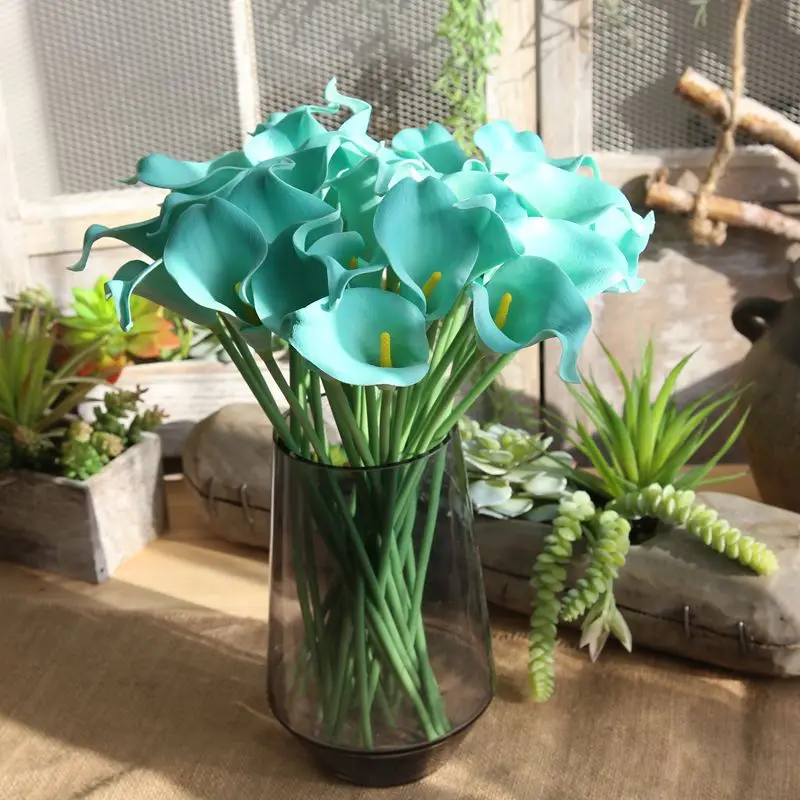 11pcs / Lot Feel Flower Calla Lily Home Wedding Party Decoration Bouquet Simulation Calla Lily Fake Artificial PU Flower Branch
11pcs / Lot Feel Flower Calla Lily Home Wedding Party Decoration Bouquet Simulation Calla Lily Fake Artificial PU Flower Branch