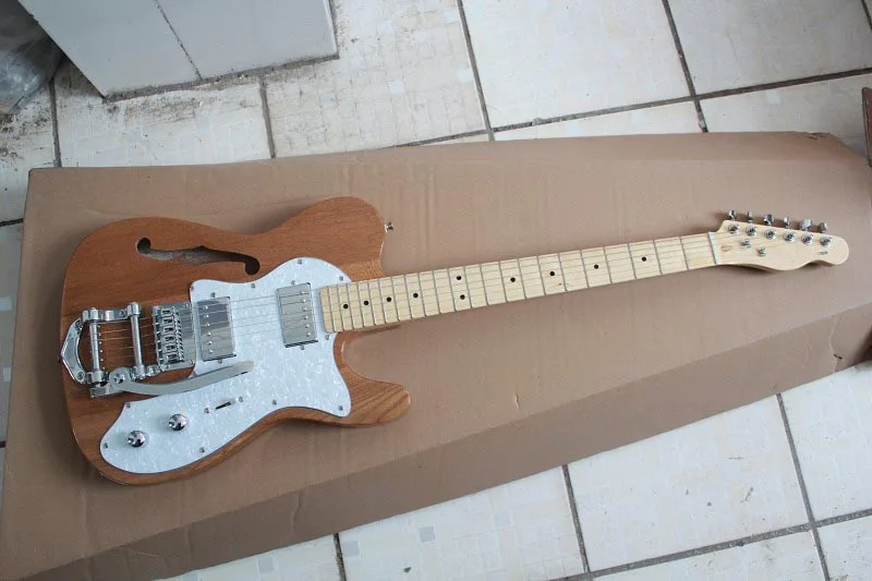 Free Shipping F Telecaster Semi Hollow Body Natural Color Jazz Electric Guitar with Bigsby Silvery Hardware In stock 15-9
Free Shipping F Telecaster Semi Hollow Body Natural Color Jazz Electric Guitar with Bigsby Silvery Hardware In stock 15-9