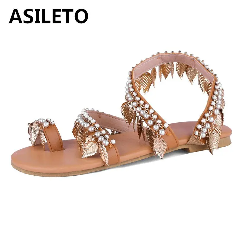 ASILETO summer shoes woman flat sandals pearl metal leaf flat shoes woman casual sandalia beach brand toe ring footwear sapato
ASILETO summer shoes woman flat sandals pearl metal leaf flat shoes woman casual sandalia beach brand toe ring footwear sapato