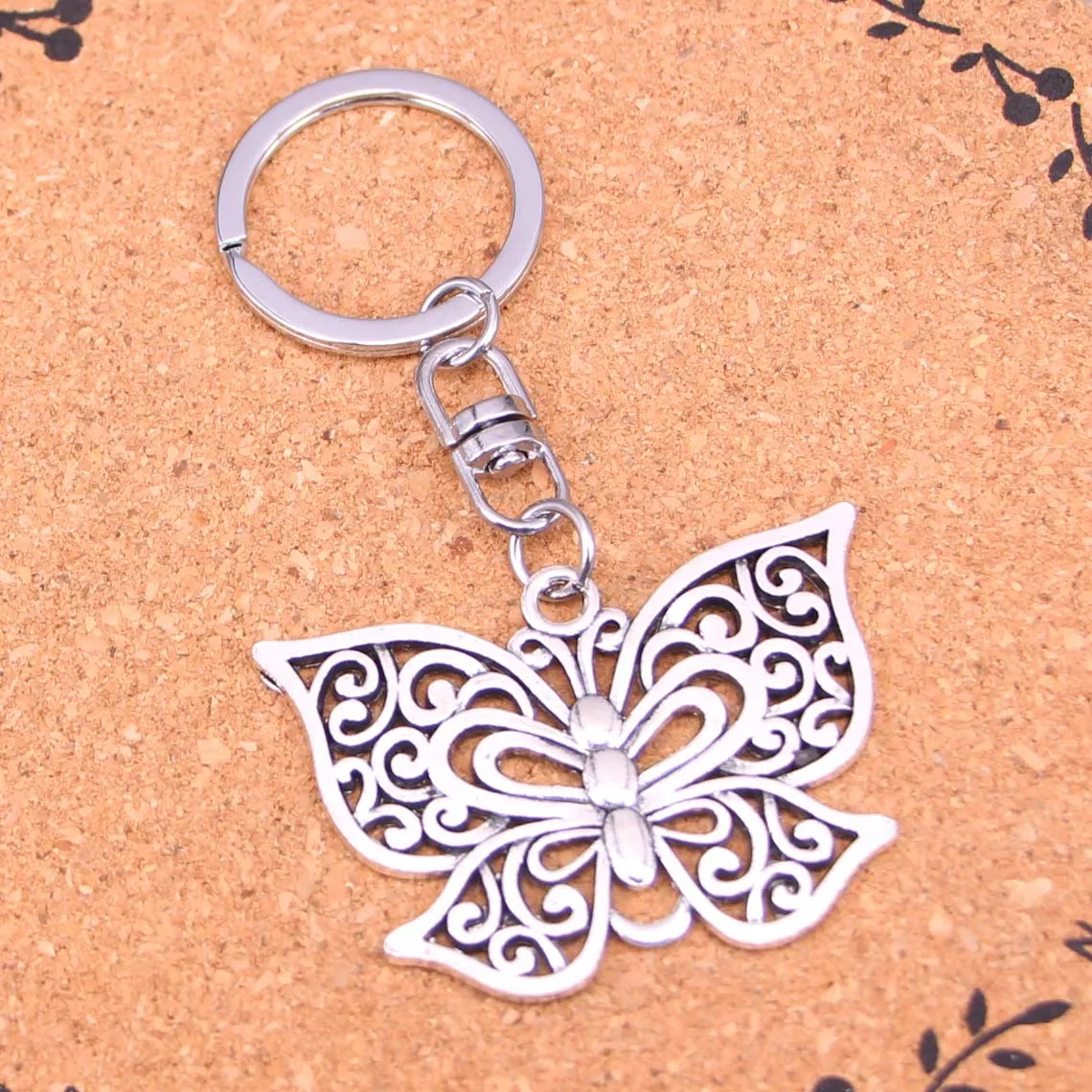 Fashion Vintage Silver Alloy Beautiful hollow butterfly Pendants keychain keyring Accessories For Car key chains Jewelry
Fashion Vintage Silver Alloy Beautiful hollow butterfly Pendants keychain keyring Accessories For Car key chains Jewelry