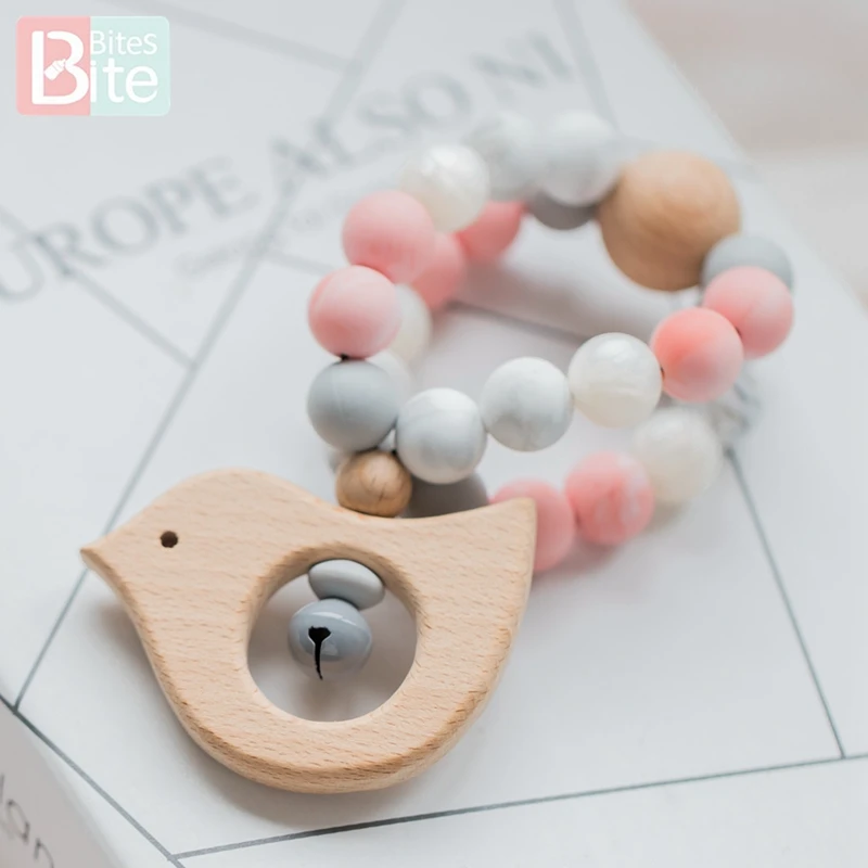 Bite Bites 1PC Baby Silicone Beads Wooden Intelligence Grasping Hand Bell For Rattle Educational Toddler Toys Children Products
Bite Bites 1PC Baby Silicone Beads Wooden Intelligence Grasping Hand Bell For Rattle Educational Toddler Toys Children Products
