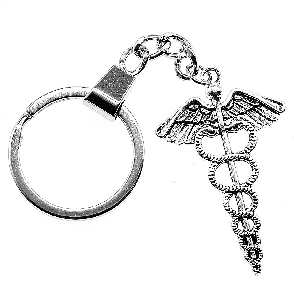 Women Jewelry Gift Key Chain New Fashion Metal Key Chains Antique Silver 49x30mm Caduceus Medical Symbol Charm Key Rings
Women Jewelry Gift Key Chain New Fashion Metal Key Chains Antique Silver 49x30mm Caduceus Medical Symbol Charm Key Rings