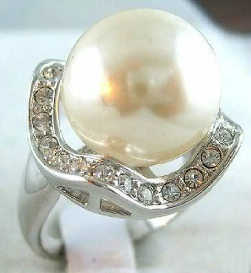 Silver Crystal 14MM White Shell Pearl Round Bead 925 sterling silver Ring size: 7.8.9
Silver Crystal 14MM White Shell Pearl Round Bead 925 sterling silver Ring size: 7.8.9
