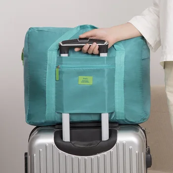 Large Capacity Travel storage Bag Waterproof Nylon Folding Hand-held Luggage Bag clothes organizer
Large Capacity Travel storage Bag Waterproof Nylon Folding Hand-held Luggage Bag clothes organizer