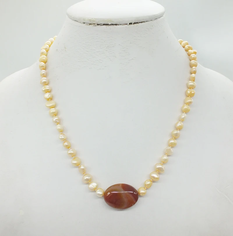 The last one, 6-7MM natural Baroque pearls. Semi-precious stones, pendant necklace 18"
The last one, 6-7MM natural Baroque pearls. Semi-precious stones, pendant necklace 18"
