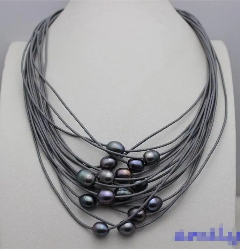 FREE SHIPPING HOT sell new Style >>>> black freshwater pearl 15strand gray Genuine leather cord necklace19-23
FREE SHIPPING HOT sell new Style >>>> black freshwater pearl 15strand gray Genuine leather cord necklace19-23