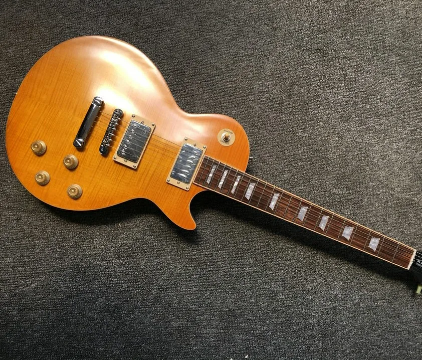 electric guitar with One Piece Body, One Piece Neck Tune-o-Matic bridge and cream matte body fret end binding guitar
electric guitar with One Piece Body, One Piece Neck Tune-o-Matic bridge and cream matte body fret end binding guitar