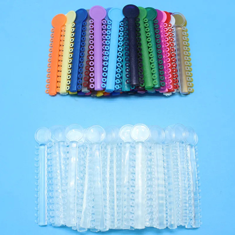 40Pcs/Pack Dental Elastomeric Ligature Ties Orthodontics Elastic Rubber Bands Teeth Care Multicolor Transparent color Dentist
40Pcs/Pack Dental Elastomeric Ligature Ties Orthodontics Elastic Rubber Bands Teeth Care Multicolor Transparent color Dentist