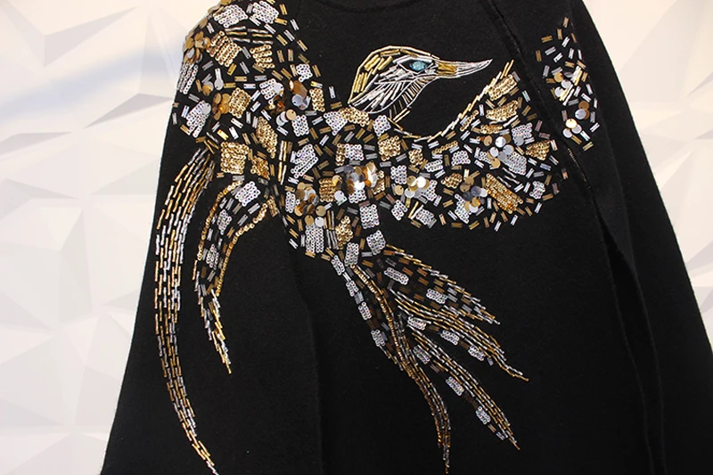 معطف شتوي محاك بالعباءه من الكشمير برسم طير النسر مطرز يدويا مطرز بالترتر للنساء معطف باكمام جديد كولكشن شتوي تريند معطف شتوي محاك بالعباءه من الكشمير برسم طير النسر مطرز يدويا مطرز بالترتر للنساء معطف باكمام جديد كولكشن شتوي تريند