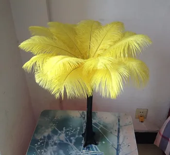 Wholesale 50pcs / lot Beautiful yellow ostrich feathers feather length 14-16 inches / 35-40 cm 
Wholesale 50pcs / lot Beautiful yellow ostrich feathers feather length 14-16 inches / 35-40 cm