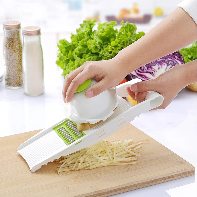 Multifunctional Vegetable Cutter With 5 Stainless Steel Blade Vegetable Slicer Potato Carrot Grater Kitchen Accessories
Multifunctional Vegetable Cutter With 5 Stainless Steel Blade Vegetable Slicer Potato Carrot Grater Kitchen Accessories