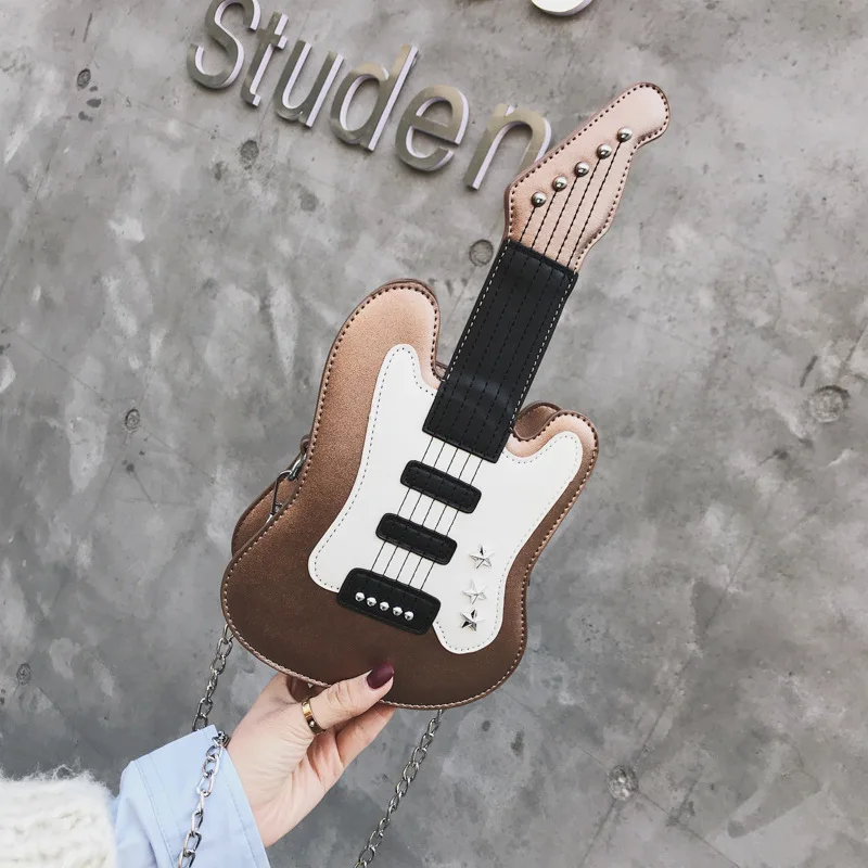 Guitar Shaped Shoulder Bag Women Casual Chains Pu Leather Color Matching Ladies Chain Purse Crossbody Mini Messenger Bag
Guitar Shaped Shoulder Bag Women Casual Chains Pu Leather Color Matching Ladies Chain Purse Crossbody Mini Messenger Bag