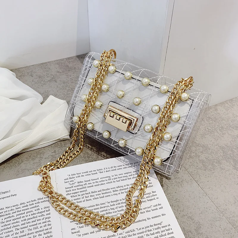 Small fresh Brand Designer Woman 2019 New Fashion Messenger Bag Chains Shoulder Bag Female pearl Transparent Square PU Handbag
Small fresh Brand Designer Woman 2019 New Fashion Messenger Bag Chains Shoulder Bag Female pearl Transparent Square PU Handbag