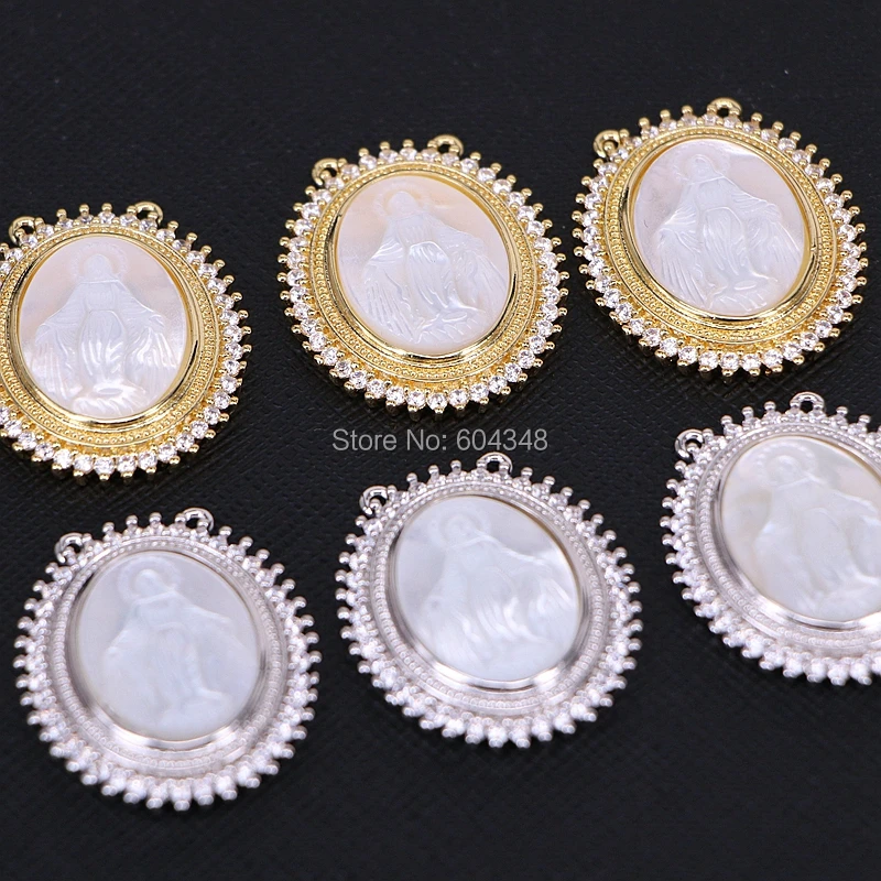 5PCS CZ Micro Pave Nature Mother of pearl Shell Jesus Pendant, with Double Bails Oval Shape Crystal Zirconia Mop Shell Pendant
5PCS CZ Micro Pave Nature Mother of pearl Shell Jesus Pendant, with Double Bails Oval Shape Crystal Zirconia Mop Shell Pendant