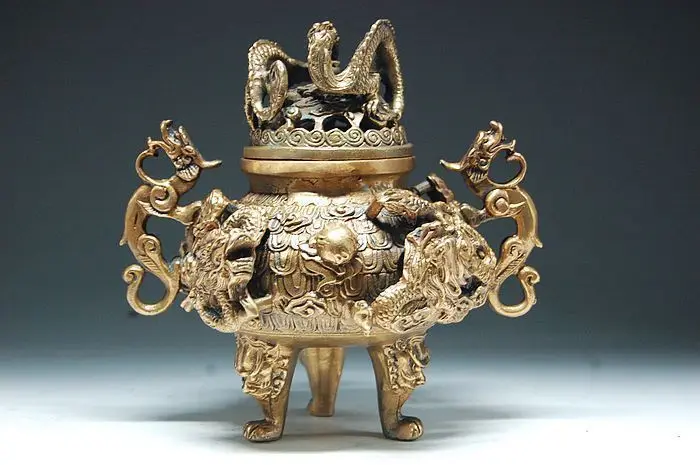 Chinese dragons carved hollow brass three legs the ancient beast incense burner
Chinese dragons carved hollow brass three legs the ancient beast incense burner