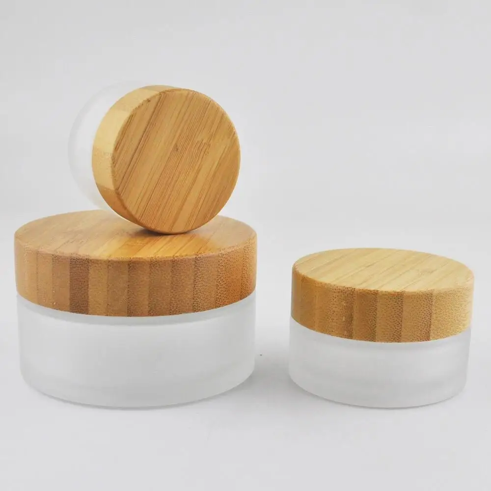 100g cosmetic bamboo lid glass jar, 50g face cream frost glass jar with bamboo lid eye cream cosmetics jar
100g cosmetic bamboo lid glass jar, 50g face cream frost glass jar with bamboo lid eye cream cosmetics jar