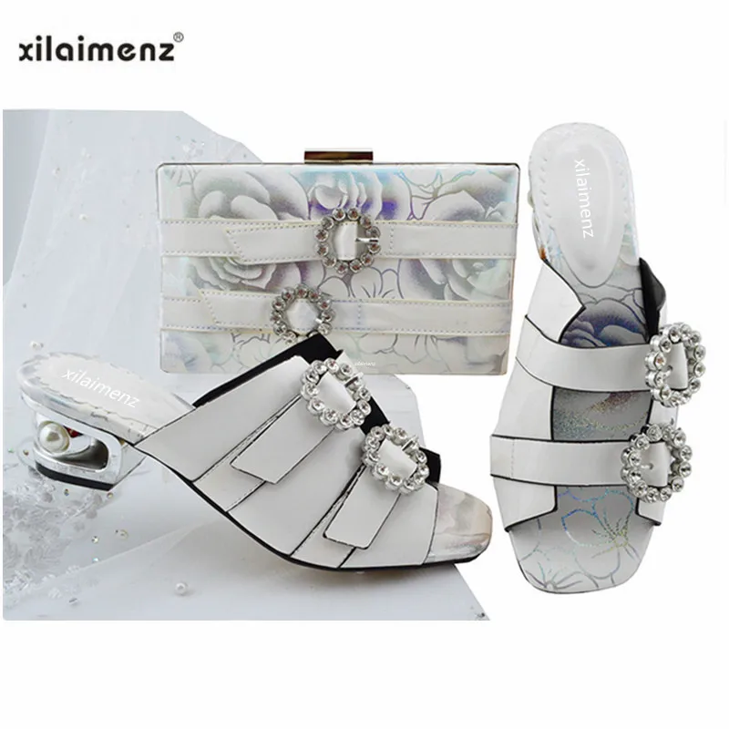New Shop 40% Discount Summer White Color with Rhinestone Nigerian Women Wedding Shoes and Bag Set Women High Heels Shoes
New Shop 40% Discount Summer White Color with Rhinestone Nigerian Women Wedding Shoes and Bag Set Women High Heels Shoes