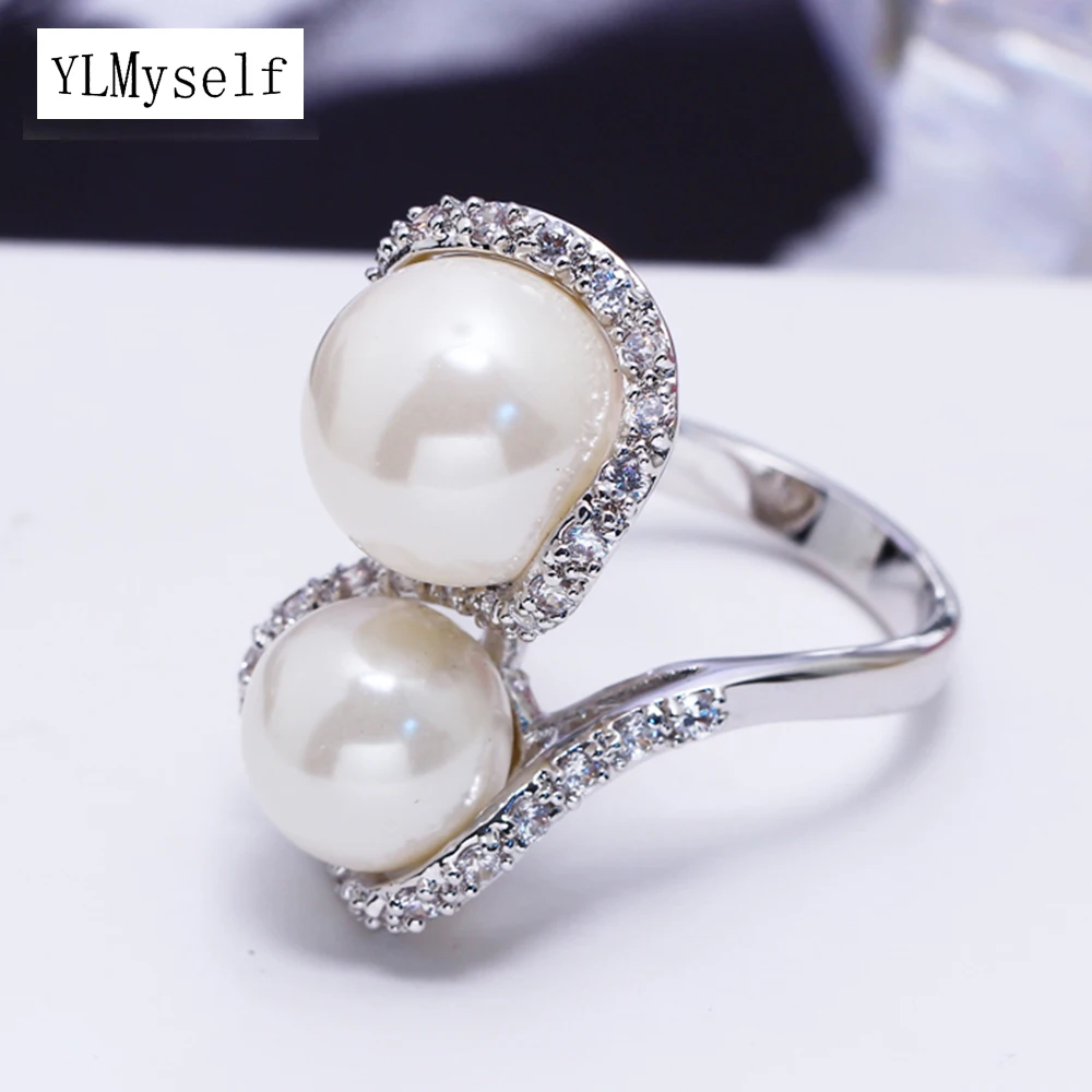 Pretty white pearl ring bright crystal fashion jewelry female trendy jewellery fast shipping high quality beautiful rings
Pretty white pearl ring bright crystal fashion jewelry female trendy jewellery fast shipping high quality beautiful rings
