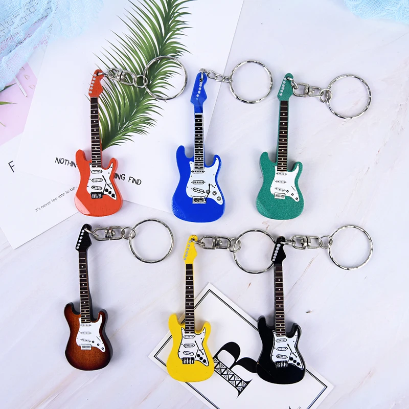 New Design Classic Guitar Keychain Car Key Chain Key Ring Musical Instruments Wooden Pendant For Man Women Gift Wholesale
New Design Classic Guitar Keychain Car Key Chain Key Ring Musical Instruments Wooden Pendant For Man Women Gift Wholesale