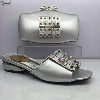 Excellent party set matching African slip-on shoes and clutch bag set with stones GY20, heel height 4cm
Excellent party set matching African slip-on shoes and clutch bag set with stones GY20, heel height 4cm