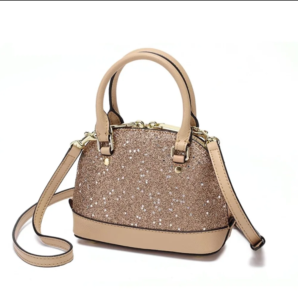 Women's new wave sequin leather wild mini bag Shell-type leather zipped wave mobile mini shoulder bag
Women's new wave sequin leather wild mini bag Shell-type leather zipped wave mobile mini shoulder bag