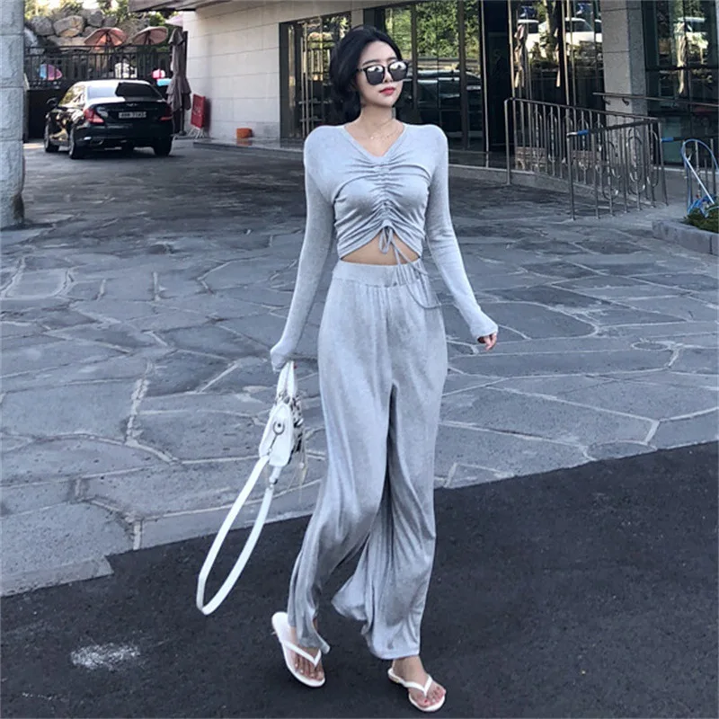 2019 Spring Korean Version New Women's Slim Long Sleeves Drawstring Shirt Loose Wide Leg Pants Fashion Suit Thin Two-piece
2019 Spring Korean Version New Women's Slim Long Sleeves Drawstring Shirt Loose Wide Leg Pants Fashion Suit Thin Two-piece