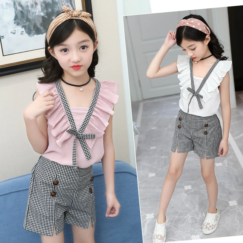 Summer Girls Clothing Kids Sleeveless Chiffon V-neck T-shirt+ Plaid Shorts 2pcs Girls Summer Suit Set Children Clothes 4-13Y
Summer Girls Clothing Kids Sleeveless Chiffon V-neck T-shirt+ Plaid Shorts 2pcs Girls Summer Suit Set Children Clothes 4-13Y