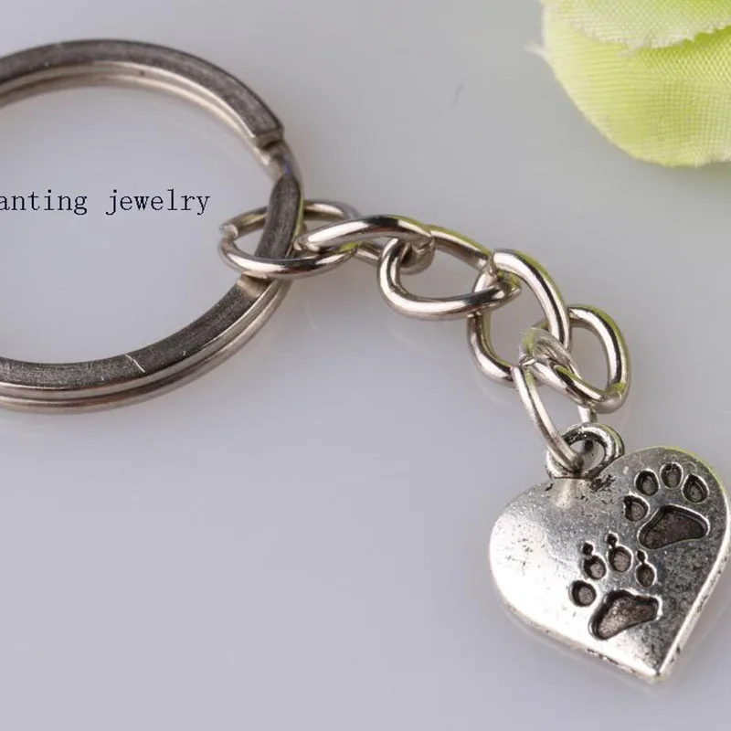 Fashion New jewelry Dog Paw Prints Charm Pendant Decorative Key Chain Ring Keychain Key Holder Package Decoration Gifts 1pcs
Fashion New jewelry Dog Paw Prints Charm Pendant Decorative Key Chain Ring Keychain Key Holder Package Decoration Gifts 1pcs