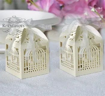 100pcs Ivory Laser Cut Bird Cage Lantern Style Boxes Favors Wedding Party Candy Boxes with Ribbon
100pcs Ivory Laser Cut Bird Cage Lantern Style Boxes Favors Wedding Party Candy Boxes with Ribbon