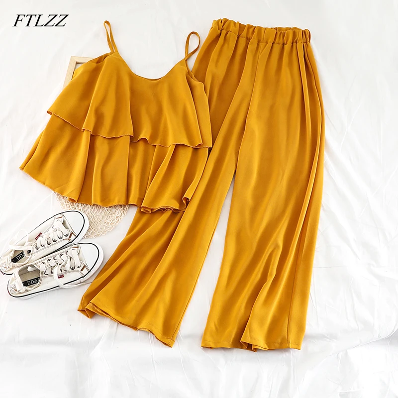 FTLZZ Two Piece Chiffon Set Women Outfits Ruffles Short Camis Tops Elastic High Waist Ankle-length Pants Beach Style Solid Set
FTLZZ Two Piece Chiffon Set Women Outfits Ruffles Short Camis Tops Elastic High Waist Ankle-length Pants Beach Style Solid Set