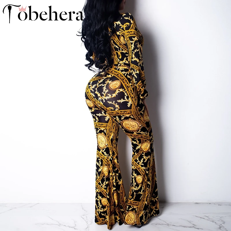 Glamaker Paisley print sexy plus size jumpsuit Deep v neck women long jumpsuit romper Vintage female summer jumpsuit black gold
Glamaker Paisley print sexy plus size jumpsuit Deep v neck women long jumpsuit romper Vintage female summer jumpsuit black gold