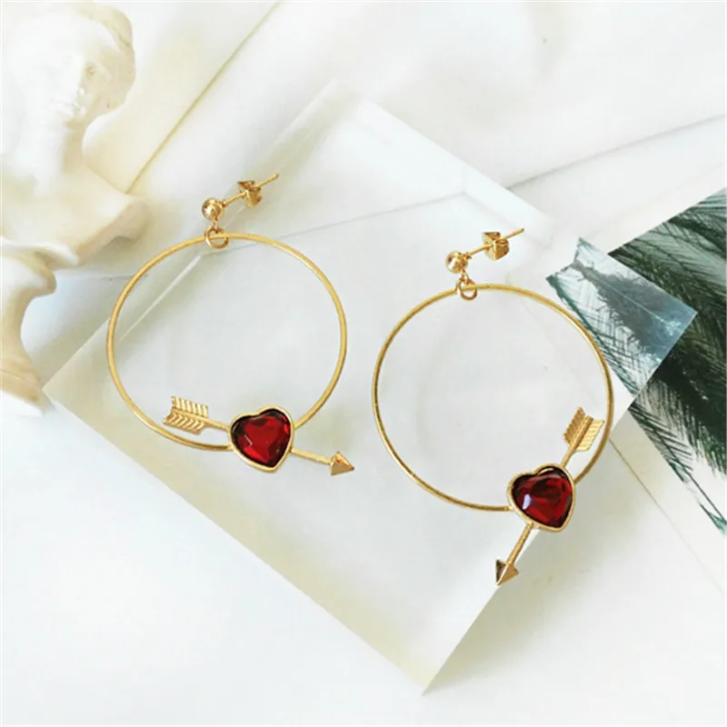Stud Earrings Fashion woman An arrow through a heart round stud earrings Red heart gold earrings for women Jewelry wholesale
Stud Earrings Fashion woman An arrow through a heart round stud earrings Red heart gold earrings for women Jewelry wholesale