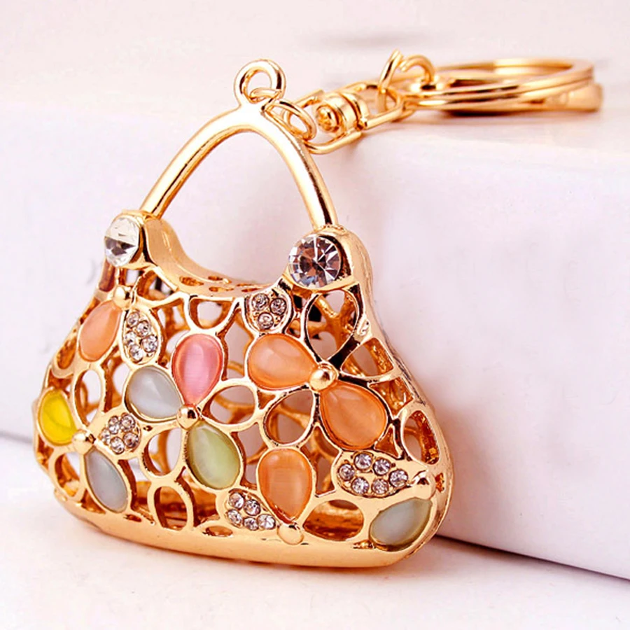 Charm Crystal Hollow Handbag Style Key Chain For Women Bag Keychain Charm Car Pendant Keyfobs llavero Accessories Gift R222
Charm Crystal Hollow Handbag Style Key Chain For Women Bag Keychain Charm Car Pendant Keyfobs llavero Accessories Gift R222