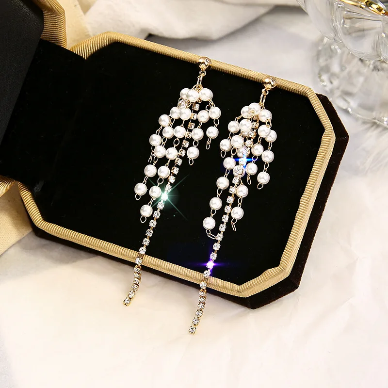 South Korea's New Fashionable Temperament Baitao French Small Pearl Tassels Long Earrings Elegant Bohemia For Women Earrings
South Korea's New Fashionable Temperament Baitao French Small Pearl Tassels Long Earrings Elegant Bohemia For Women Earrings