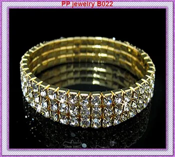 Luxury Wedding Costume Gold Tone 3 Row Shiny Crystal Elastic Alloy Bracelet
Luxury Wedding Costume Gold Tone 3 Row Shiny Crystal Elastic Alloy Bracelet
