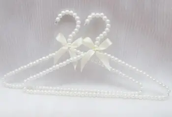 New arrival pearl plastic adult hanger clothes rack coat sweater dress hangers white bowknot hnagers accessories
New arrival pearl plastic adult hanger clothes rack coat sweater dress hangers white bowknot hnagers accessories