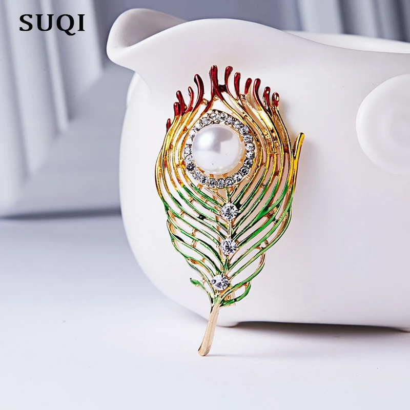 SUQI Vintage exquisite plant leaves lapel Brooch pins Artificial pearl Rhinestone Enamel brooches Pin for Women's Jewelry 2019
SUQI Vintage exquisite plant leaves lapel Brooch pins Artificial pearl Rhinestone Enamel brooches Pin for Women's Jewelry 2019