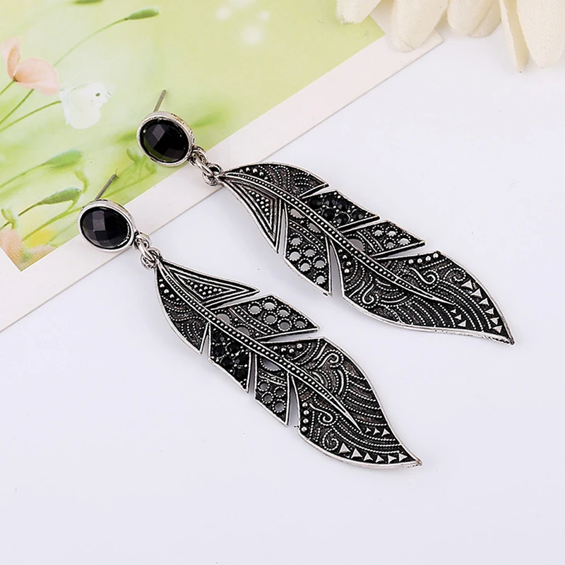 Bohemian Vintage Silver Leaf Feather Big Drop Earrings Women New Fashion Long Statement Earring Maxi Brincos Hollow Out Earrings
Bohemian Vintage Silver Leaf Feather Big Drop Earrings Women New Fashion Long Statement Earring Maxi Brincos Hollow Out Earrings