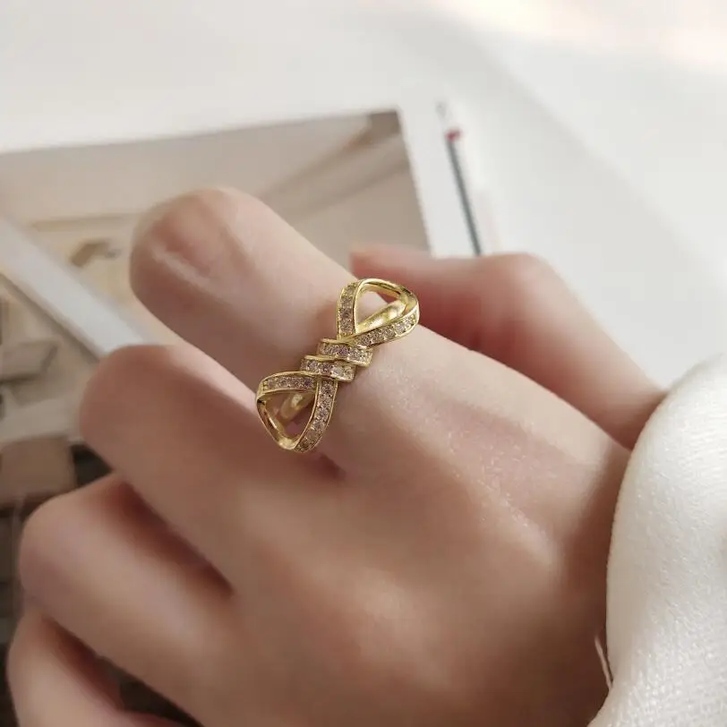 2019 Gold 925 Sterling Silver Sparkling Bow Knot Stackable Ring Micro Pave CZ Open Rings For Women Valentine's Day Gift Jewelry
2019 Gold 925 Sterling Silver Sparkling Bow Knot Stackable Ring Micro Pave CZ Open Rings For Women Valentine's Day Gift Jewelry