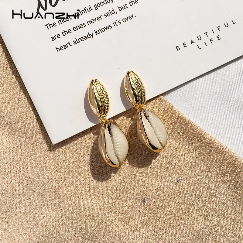 HUANZHI 2019 Chic Design Ocean Shell Gold Metal Plated Freshwater Pearls Drop Earrings For Women Travel Beach Jewelry Gifts
HUANZHI 2019 Chic Design Ocean Shell Gold Metal Plated Freshwater Pearls Drop Earrings For Women Travel Beach Jewelry Gifts