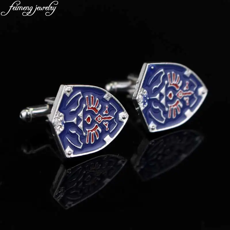 The Legend of Zelda Triforce Shield Cufflinks Fashion Blue Enamel Shield Shirt Cuff Links Novelty Charm Cosplay Jewelry For Men
The Legend of Zelda Triforce Shield Cufflinks Fashion Blue Enamel Shield Shirt Cuff Links Novelty Charm Cosplay Jewelry For Men