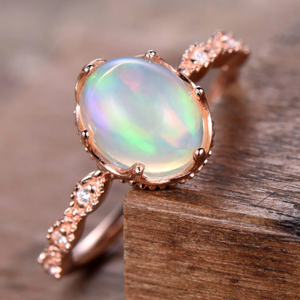Natura Ethiopian Fire Opal Oval Shape 8*10mm Vintage Elegant with Moissanite 14k Rose Gold For Women 
Natura Ethiopian Fire Opal Oval Shape 8*10mm Vintage Elegant with Moissanite 14k Rose Gold For Women