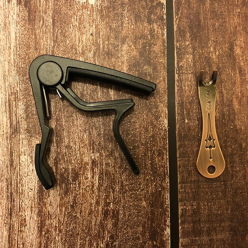 Metal Guitar Capo Quick Change Clamp Key Acoustic Classic Guitar Capo and String Peg Pulling Puller Bridge Pin Remover Tool
Metal Guitar Capo Quick Change Clamp Key Acoustic Classic Guitar Capo and String Peg Pulling Puller Bridge Pin Remover Tool