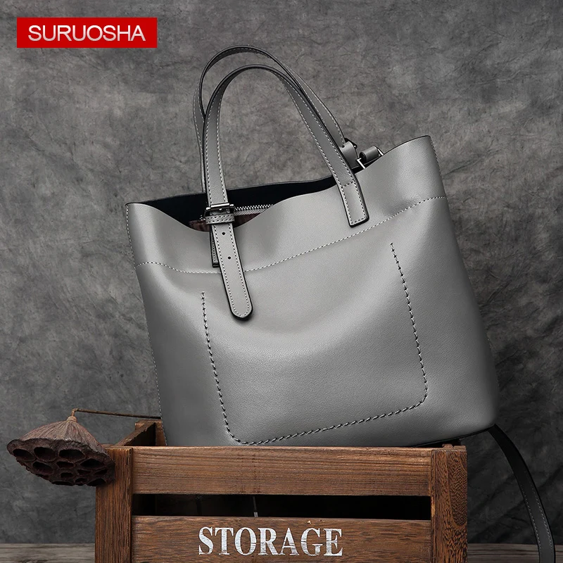 SURUOSHA Russia Women Loved Genuine Leather Tote Bag Luxury Brand Designer Leisure Top-handle Bags Lady Casual Cow Leather Bags
SURUOSHA Russia Women Loved Genuine Leather Tote Bag Luxury Brand Designer Leisure Top-handle Bags Lady Casual Cow Leather Bags