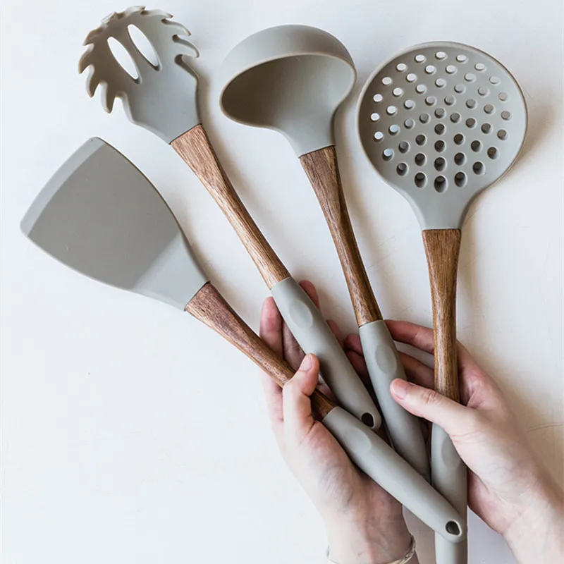Heat Resistance Silicone Cooking Tools with Wooden Handle Non-Stick Turners Spoons Noodle Scoops Creative Kitchen Utensil Sets
Heat Resistance Silicone Cooking Tools with Wooden Handle Non-Stick Turners Spoons Noodle Scoops Creative Kitchen Utensil Sets